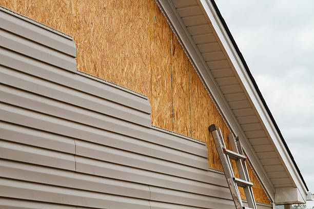 Professional Siding technician working in Antioch, IL